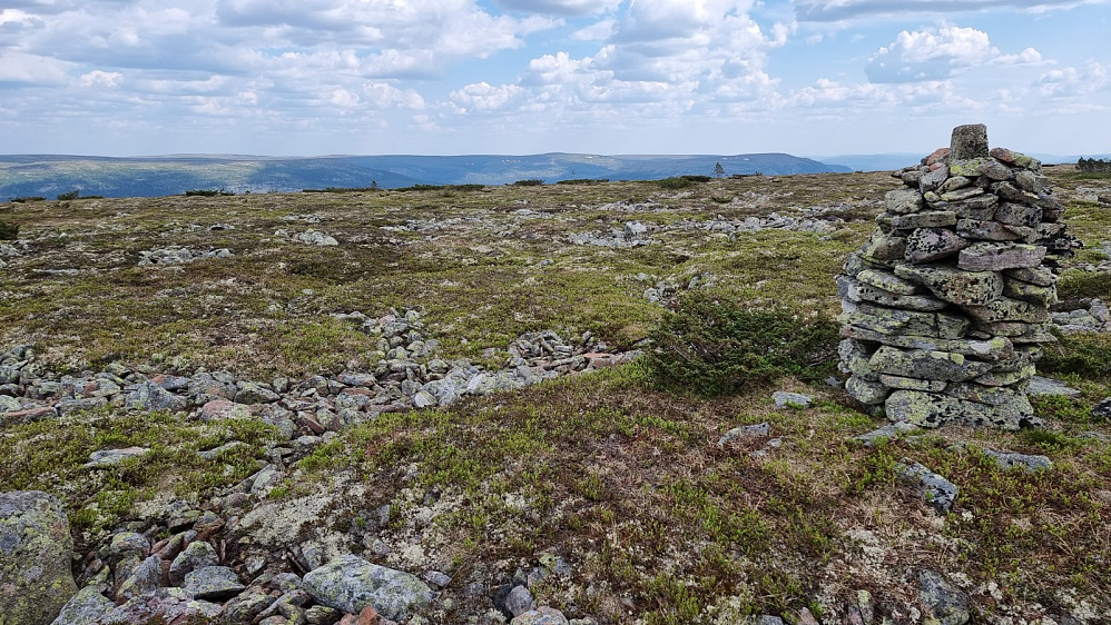 Her et sted er høyeste punktet på denne veldig flate toppen