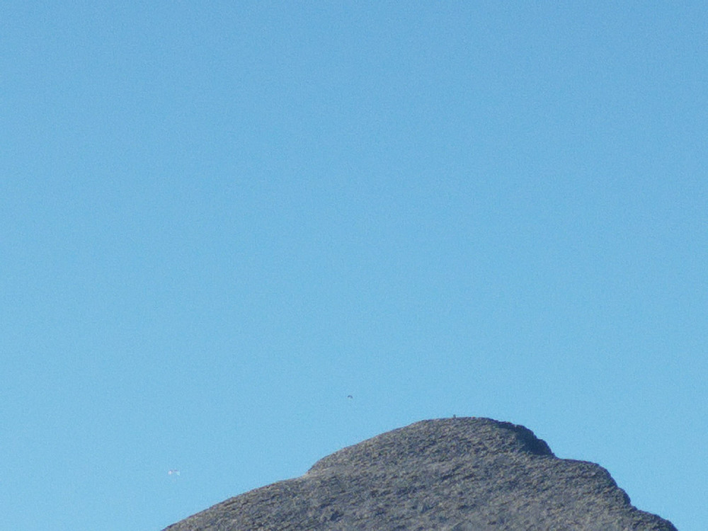 Paraglider ved toppen av Høgronden