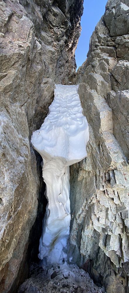 Image #5: Hitherto, but no longer... Due to the heat of the summer, a lot of snow and ice had been melting away, and so I arrived at this huge ice step, higher than myself, where I was unable to continue up the steep chute. (Vertical Photoshop panorama from two merged photos).