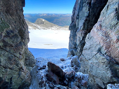 Image #6: View of Adelsbreen Glacier and Mount Soggefjellet from the crevice between Mount Store Trolltind and Mount Vestre Trolltind. Part of Romsdalseggen Mountain Range is also seen.