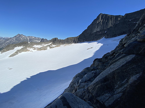 Image #7: Adelsbreen Glacier and Mount Store Trolltind as seen from the foot of Mount Trollklørn. The glacier extends quite a bit up the mountain side of Mount Trollklørn, and care must be taken when crossing over from glacier to mountain (see text).