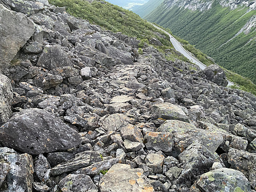 Image #38: The upper part of the Packhorse Trail. This trail existed a long, long, time before Trollstigen Hairpin Road was constructed, and it is said that the farmers in Valldalen Valley even from the 16th century were leading cattle and horses along this trail over the mountain in order to sell them at the market in the valley of Romsdalen [i.e. the valley of the river ''Rauma''].