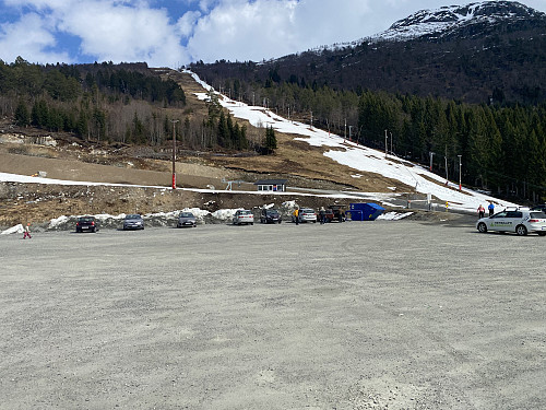 Image #1: Snow wasn't exactly abundant by the parking lot at Stryn Winter Ski Centre, but there was still some snow in the downhill slopes, where the snow had been prepped by Snowcats during the winter season.