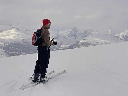 Image 11: The view from the summit area of Mount Kragefjellet. The renown Mount Honndalsrokken [1527 m.a.m.s.l.] is seen just a little to the right of the middle of the picture.