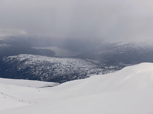 Image #12: The view from Mount Kragefjellet towards the fjord of Nordfjord. Part of the upper ski lift might be spotted far down in the valley.