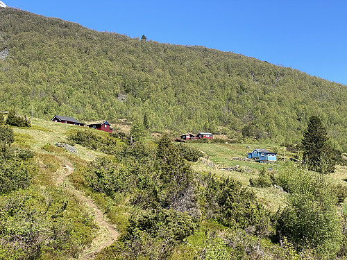 Image #3: At 450 m.a.m.s.l. you arrive at Mosætra, a location with cabins once used for summer cattle husbandry, but currently just used for recreation.