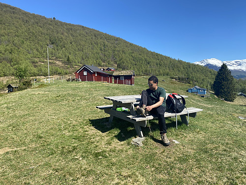 Image #4: At Mosætra there were benches to sit on, and so we used the opportunity to fix and tighten out trekking boots.