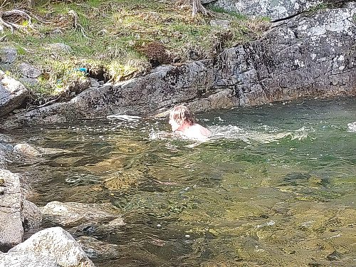 Image #15: Having a swim in the "Hawaii pond" in Skardselva River in the hot weather.