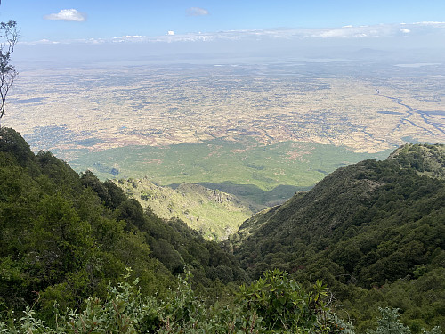 Image #19: A southeast view from the southeast ridge of the crater. Lake Gelila, or the Koka Reservoir on the Awash river is seen afar.