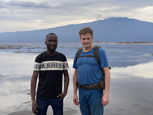 Image #13: Frank and myself posing in front of Lake Natron and the flamingos. The mountain in the background of these images is Mount Gelai or Kilayi [2946 m.a.m.s.l.].