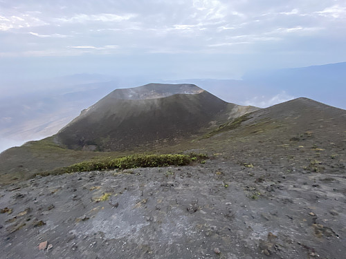 Image #20: The crater of the volcano as seen from the summit. The valley between the summit and the crater is an older crater.