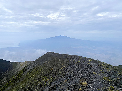 Image #22: View from the summit of Ol Doinyo Lengai towards Mount Gelai [2946 m.a.m.s.l.]. Lake Natron is seen to the left of Gelai.