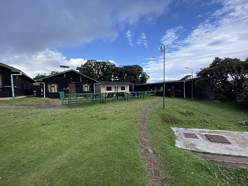 Image #12: The building to the right houses a large dining room, with enough space, even when the camp is full of guests.