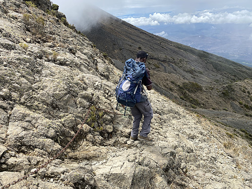 Image #26: Holson on the trail between "The Saddle" and the mountain knoll called the "Rhino Point".