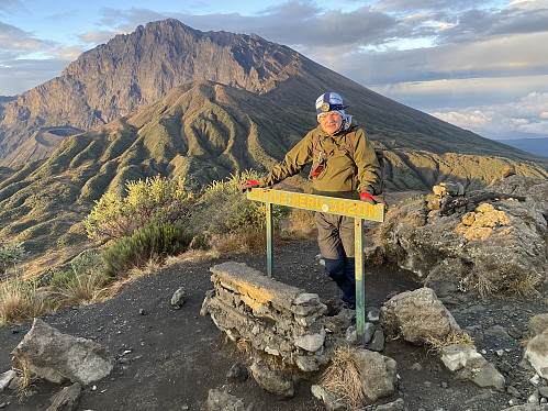 Image #44: Standing on the summit of Little Meru, with Meru, the Rhino Point, and the Ash Cone all in the background.