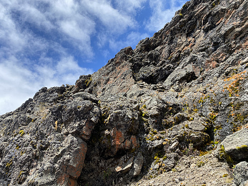 Image #30: The last few meters up to the Mawenzi Midpoint are a little bit steep. Climbing gear is hardly required to get up here, but you need it to continue further above.