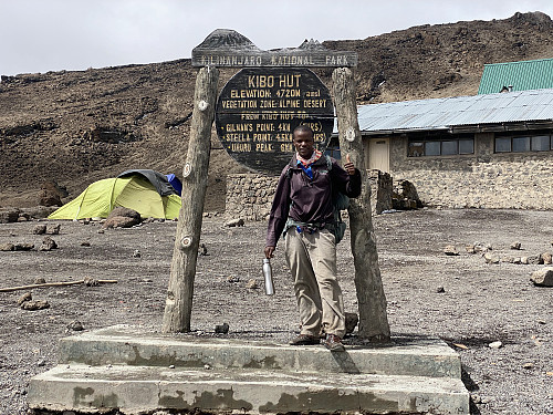 Image #42: Our chef, Goodlisten Teete, at the Kibo Hut camp site. This guy is extremely well fit, and moves faster in the mountain than most porters.