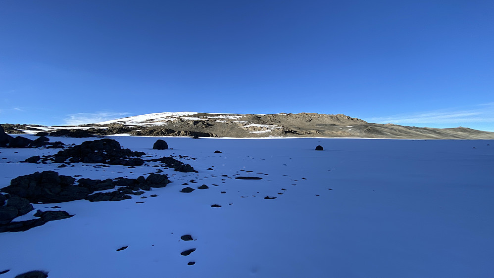 Image #62: Looking back at Mount Kibo on our way back to the Stella Point. The crater cannot be seen in this image, as we're located in the valley below the top of the mountain.