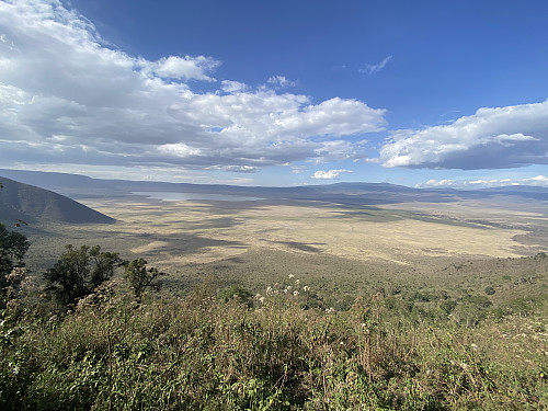 Image #7: A view of the Ngorongoro Crater with lake Magadi within it. The "crater" is actually a huge caldera, i.e. the remains of a huge volcanic mountain that has once upon a time collapsed.
