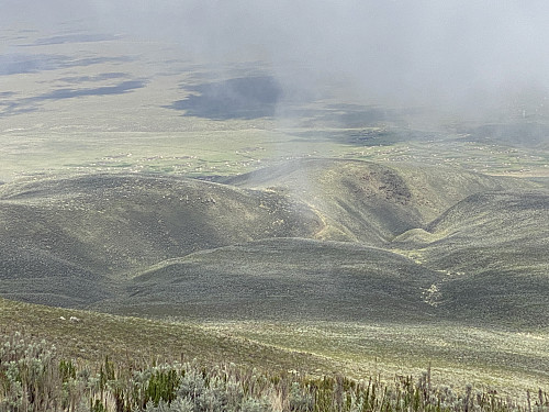 Image #24: Descending from the mountain, into the valley between Mount Loolmalasin and Mount Empakaai. The village seen is the Masai village of Bulati, from where we had started out in the early morning.