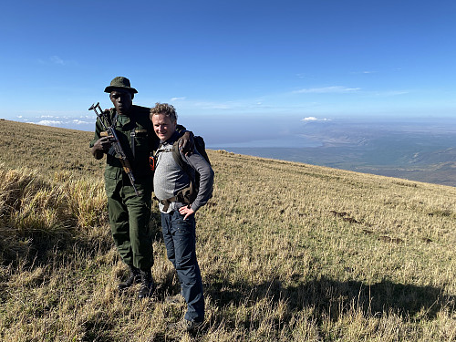 Image #9: Me and the ranger, at the point were we had to stop and turn around. Lake Eyasi is seen in the background.