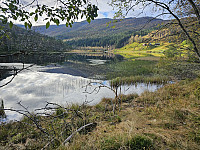 Rasdalsvatnet og gårdene Øvre Rasdalen
