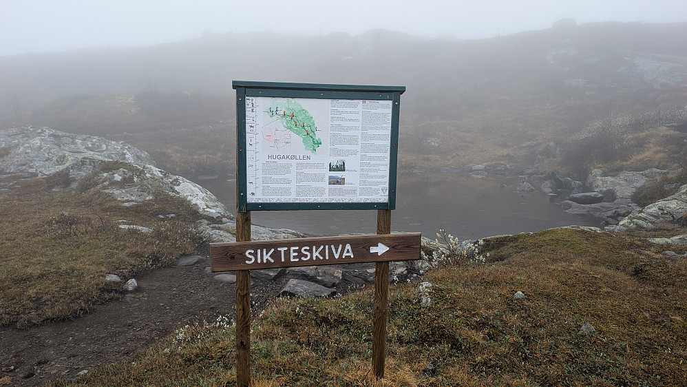 Viser vei til ei sikteskive på toppen...men ingen skive på toppen. 