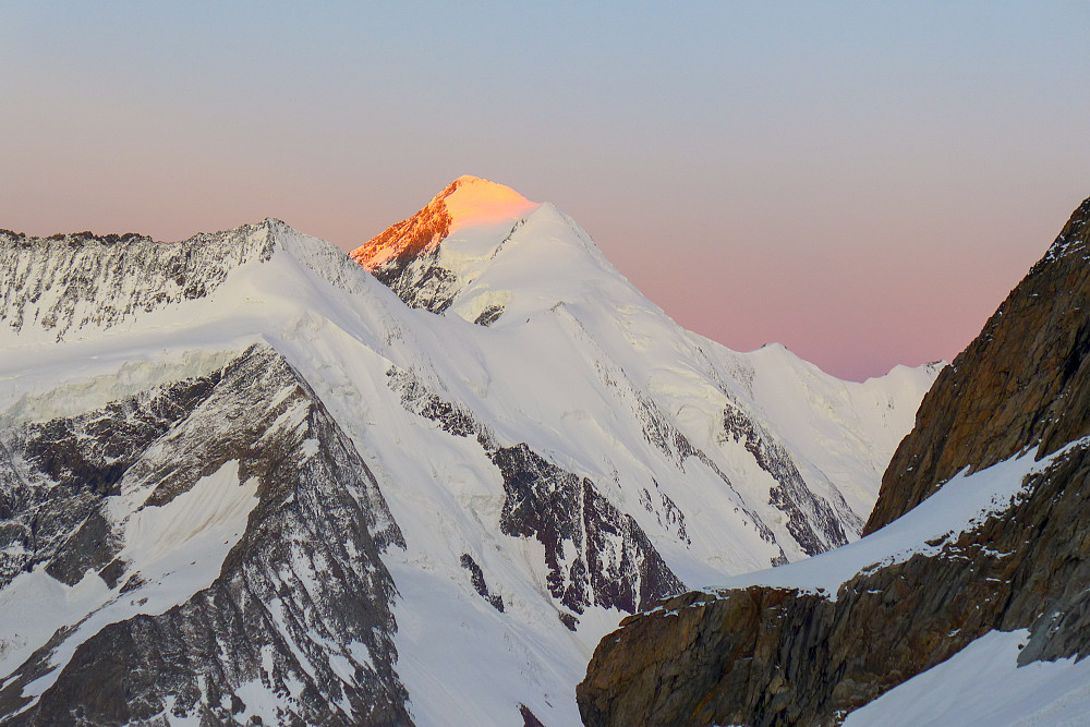 First rays of sun over the Aletschhorn