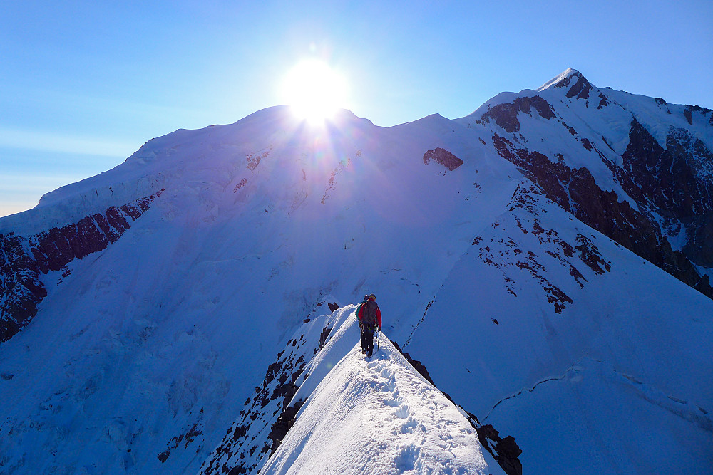 A pair of climbers descending the East ridge.