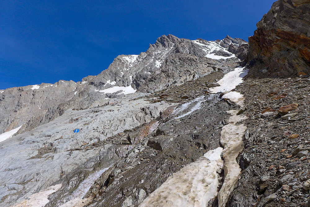 Entrance to the south face couloir marked by the obvious arrow on the left side