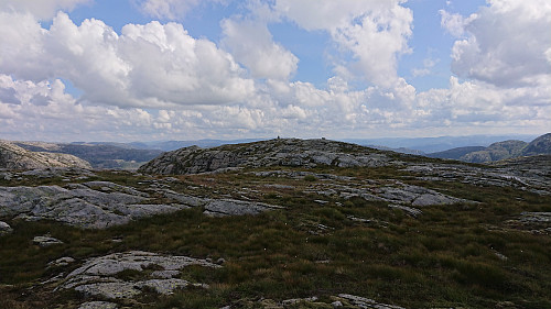 Looking back at the summit from the northwestern cairn