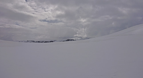 The sun hitting Skriki in the far distance