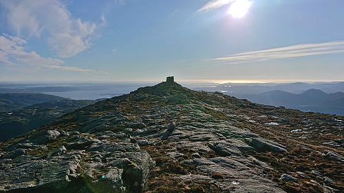 Looking back at the cairn from the highest point at Ådneburen