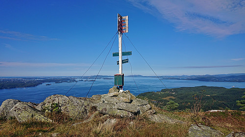 The trig marker at Gjøvågsfjellet with Øygarden in the background