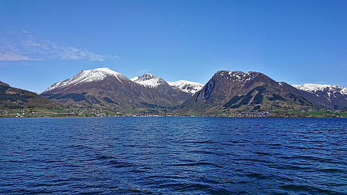 Rosendal from the pier at Snilstveitøy with Melderskin, Laurdalstind and Malmangersnuten in the background