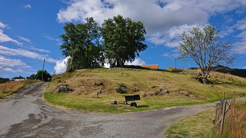 The trig marker at Saurås can be spotted at the center just to the right of the left tree. Taken seconds before it started pouring down.