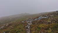 Entering the low-hanging clouds