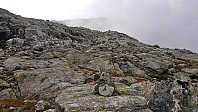 Cairn markers towards Olsskavlen