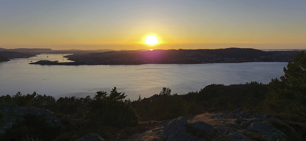 The setting sun from west of the summit at Ørneberget