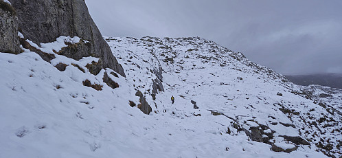 On the way to the summit in wet snow 