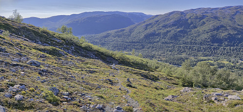 The rock-covered terrain finally turning into a trail
